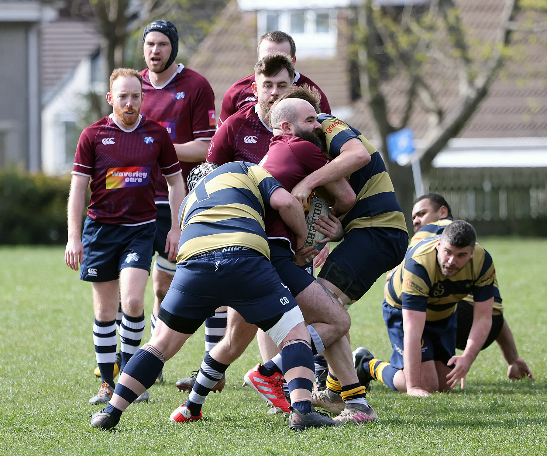 Paul Holland and Cameron Blackwood tackle a Thebans player